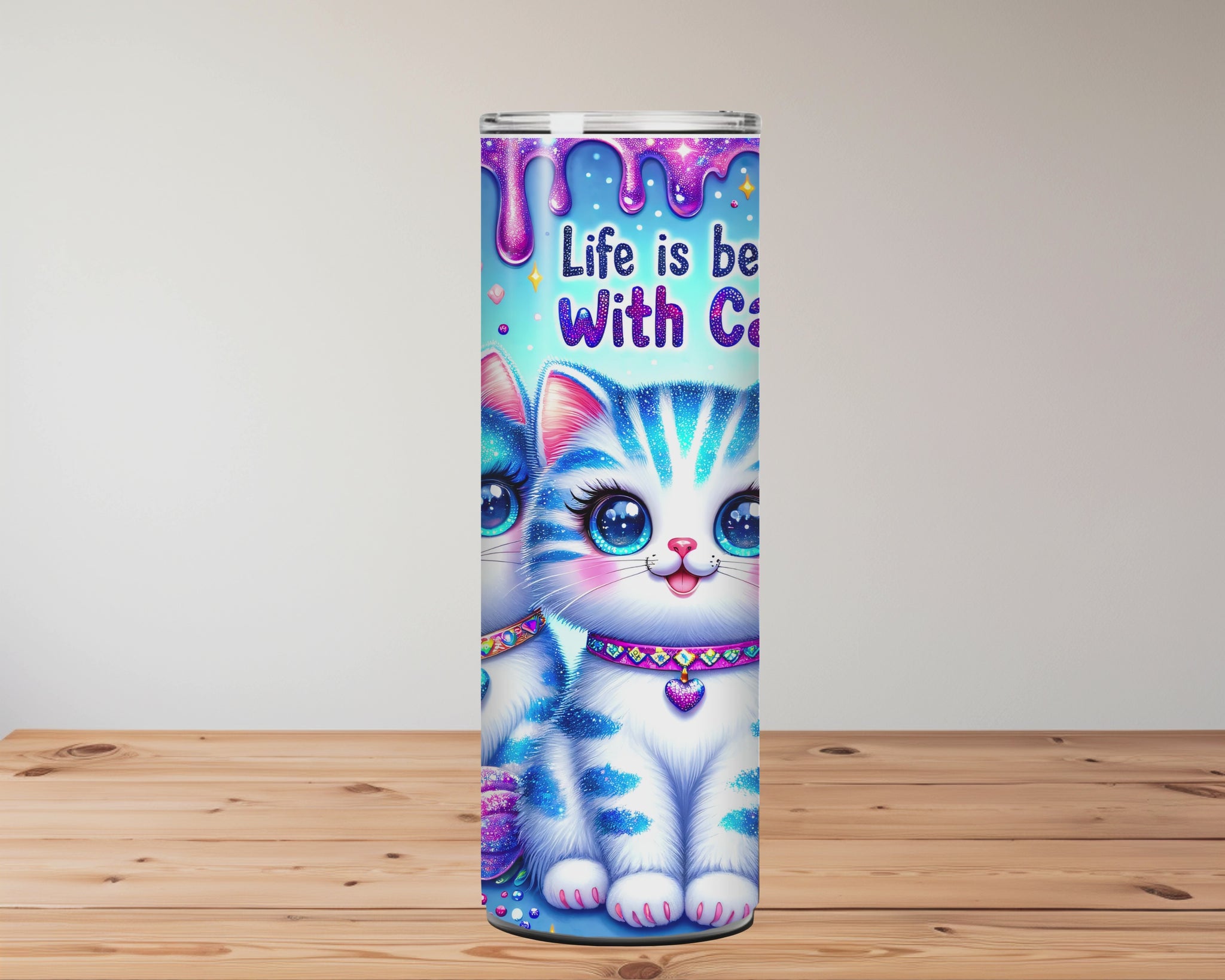 Colourful tumbler with cartoon cats on a wooden surface  Miss Mafia