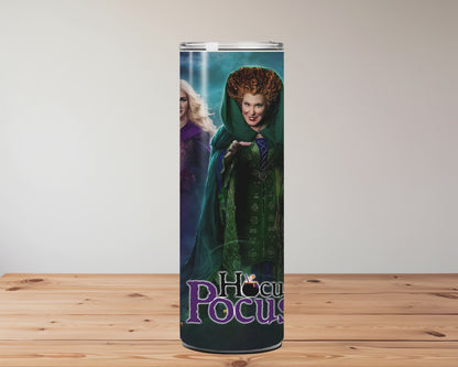 tumbler with 'Hocus Pocus' characters on a wooden surface Miss Mafia